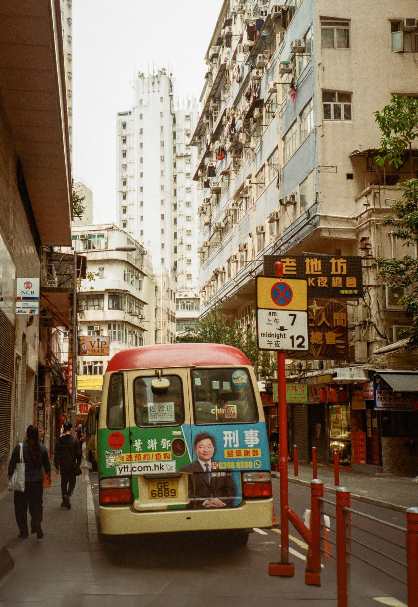 Rear of a green minibus