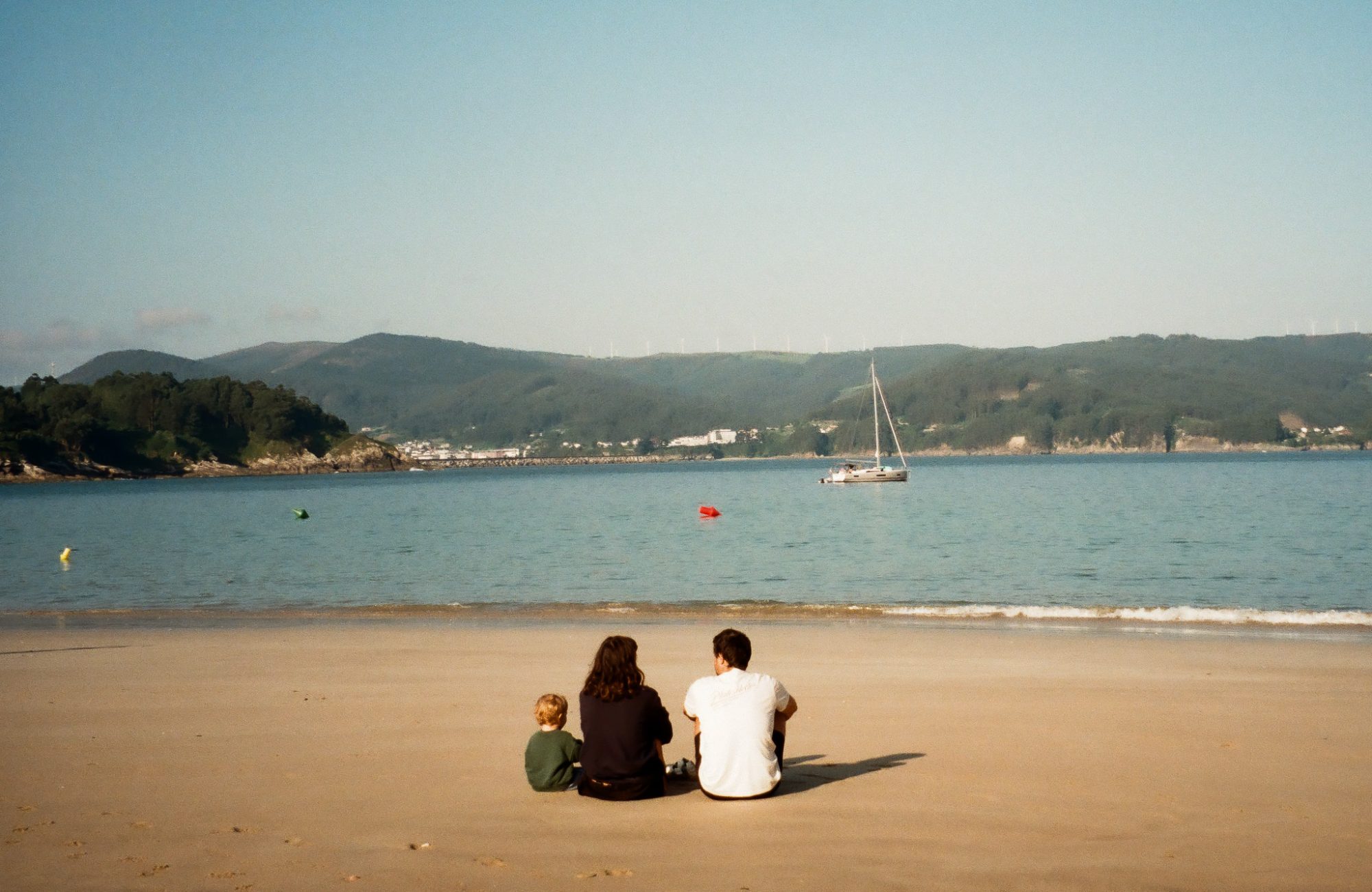 Three backs, one sail