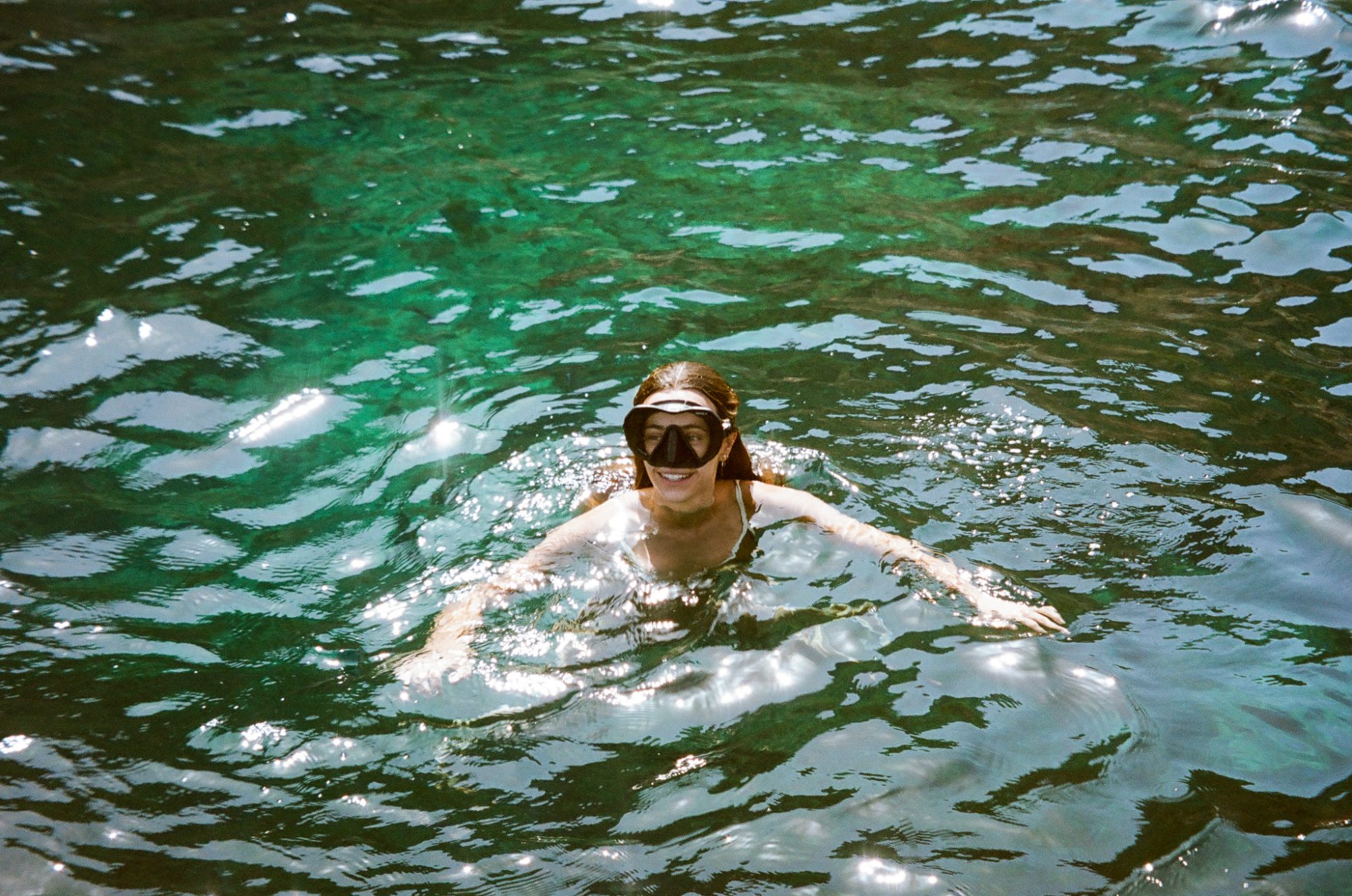 Surfacing, smiling